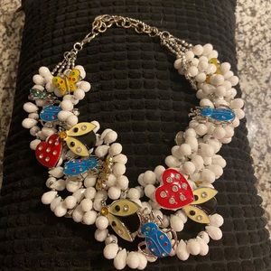 Vintage Sassy Jones “Love Bug” Bib Necklace (White)